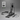 Black exercise equipment set with digital display on a gray background