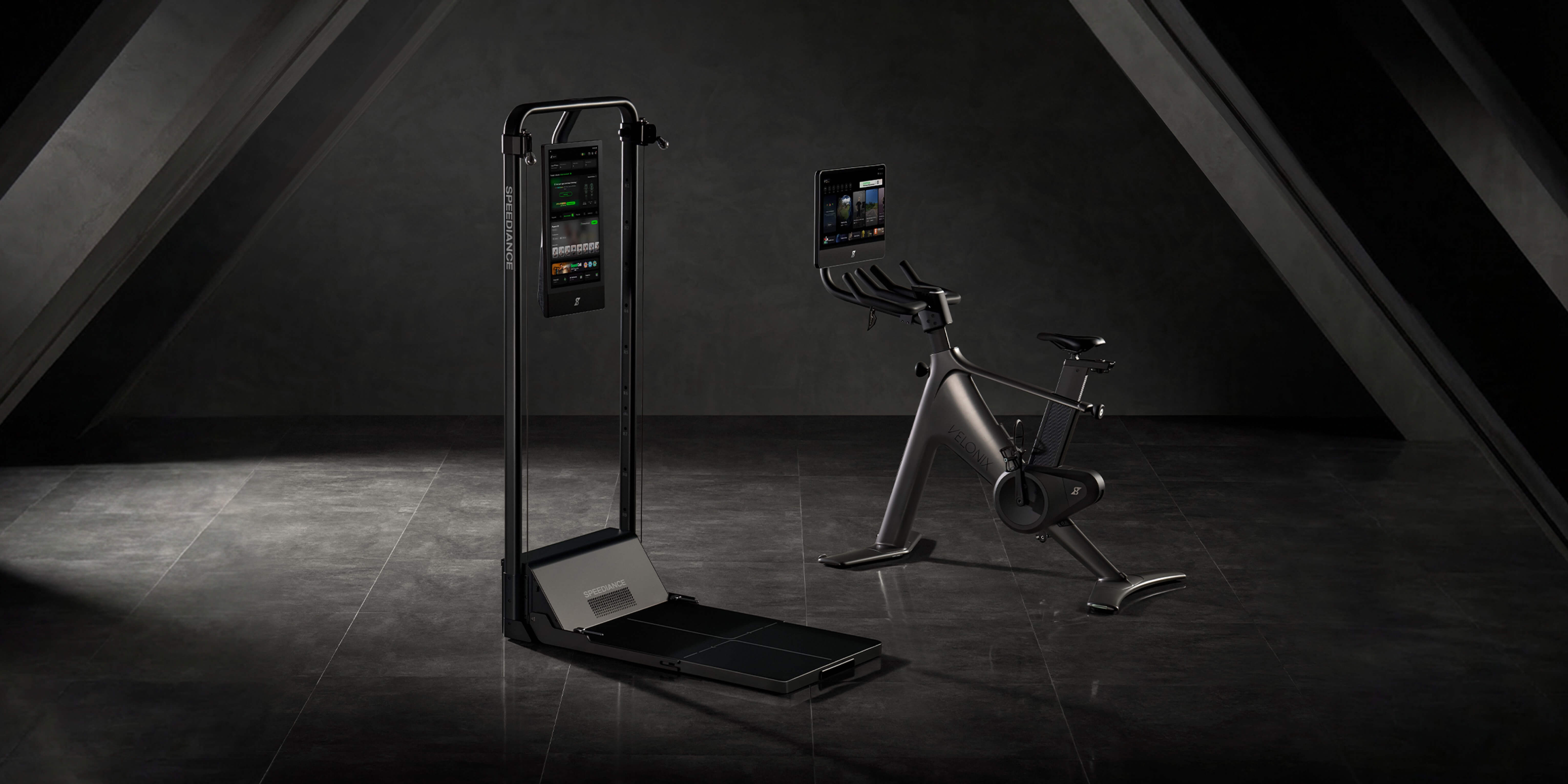 Modern exercise bike and treadmill in a dark room with smartphone screens displaying workout apps.