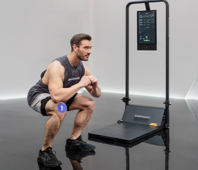 An individual crouched in a squatted position
