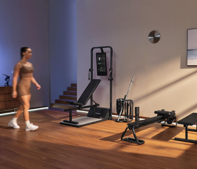 Woman walking over to gym setup