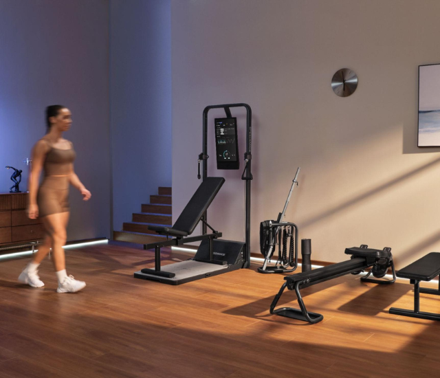 Woman walking over to exercise machine