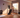 An individual adjusting their Speediance Gym Monster 2 in their home gym