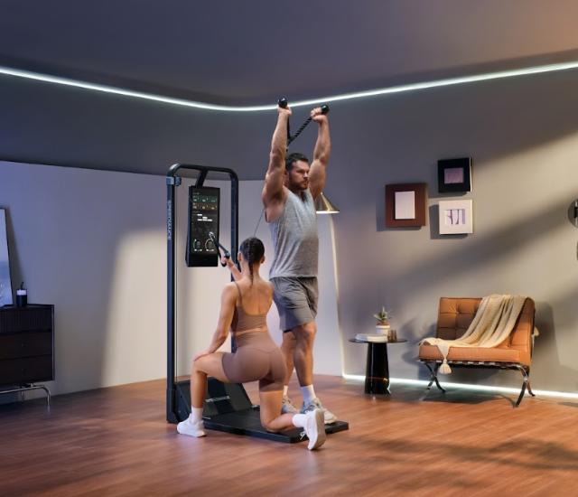 A woman and man both use the Speediance Gym Monster 2