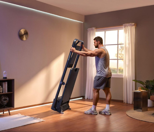 Man setting up Speediance Gym Monster 2