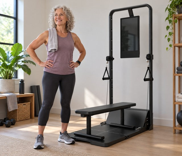 Older woman preparing to train beside a Speediance Gym Monster 2