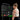 Woman looking at a Gym Monster fitness tracking device with digital screens displaying health data.