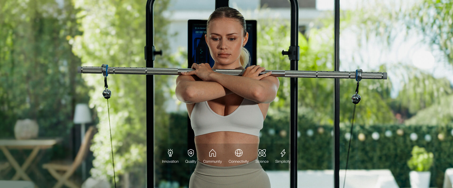 Woman exercising with a pull-up bar in an outdoor setting
