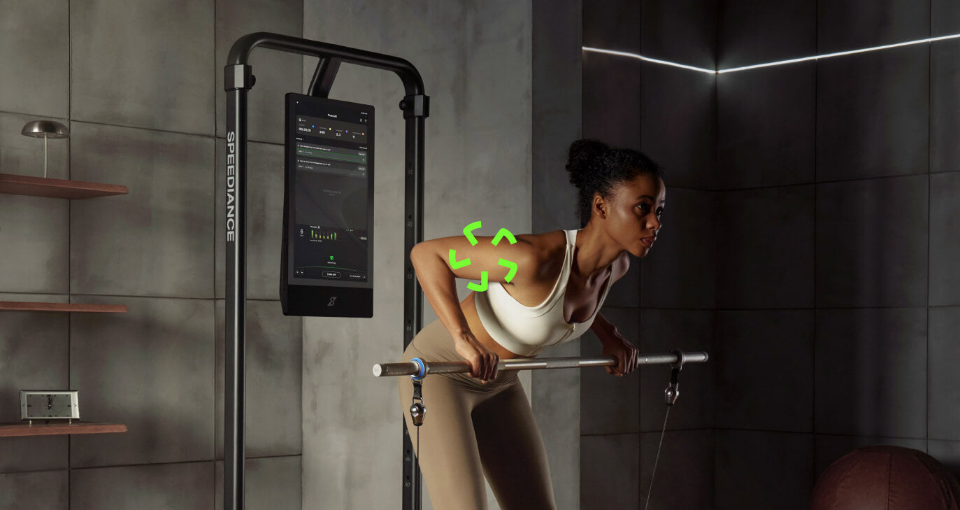 Woman exercising with a home gym setup in a modern bathroom
