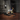 Person using a home gym machine with 'affirm' branding in a dimly lit room.